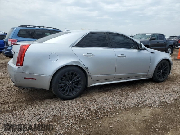 2011 Cadillac CTS Performance with VIN 1G6DL5ED2B0164311, listed as a Copart auction lot 61906165 with 134,244 mi miles and Salvage title. Bid and sale history available at DreamBid. Image 3.