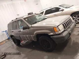 1998 Jeep Grand Cherokee Laredo with VIN 1J4GZ58S3WC343555, listed as a IAAI auction lot 41528943 with 219,146 mi miles. Bid and sale history available at carsss.com. Image 14.