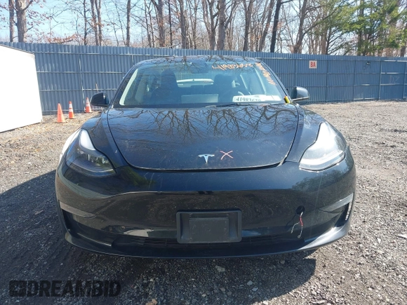 2023 Tesla Model 3 Long Range with VIN 5YJ3E1EB1PF392027, listed as a IAAI auction lot 41983638 with 31,415 mi miles and . Bid and sale history available at DreamBid. Image 11.
