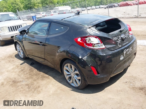 2013 Hyundai Veloster w/Black Int with VIN KMHTC6AD5DU164900, listed as a IAAI auction lot 36770576 with 106,253 mi miles and . Bid and sale history available at DreamBid. Image 3.