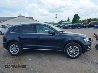2016 Audi Q5 Premium Plus z VIN WA1L2AFP3GA035874, wystawiony jako IAAI lot #42618317 z przebiegiem 40 980 mil mil oraz . Historia ofert i sprzedaży dostępna na DreamBid. Obrazek 13.