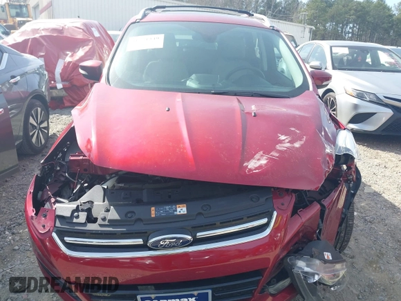 2016 Ford Escape Titanium with VIN 1FMCU0J93GUB11073, listed as a IAAI auction lot 41751349 with 92,000 mi miles. Bid and sale history available at carsss.com. Image 12.