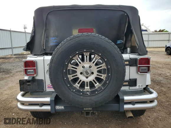 2007 Jeep Wrangler Sahara with VIN 1J4FA54107L184012, listed as a Copart auction lot 51386595 with 79,261 mi miles and Clean title. Bid and sale history available at DreamBid. Image 6.