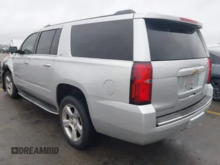 2015 Chevrolet Suburban LTZ with VIN 1GNSCKKC1FR507665, listed as a IAAI auction lot 41517753 with 162,604 mi miles. Bid and sale history available at carsss.com. Image 3.