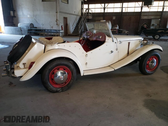 1971 Volkswagen Beetle with VIN 1112313102, listed as a Copart auction lot 55659265 with 3,677 mi miles and Salvage Title. Bid and sale history available at DreamBid. Image 3.