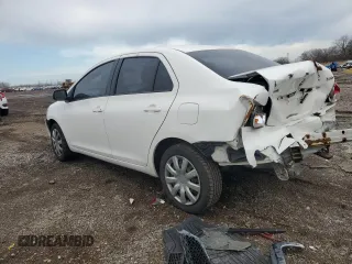 2009 Toyota Yaris with VIN JTDBT903991338082, listed as a Copart auction lot 51156955 with 328,941 mi miles and Salvage Title. Bid and sale history available at carsss.com. Image 2.