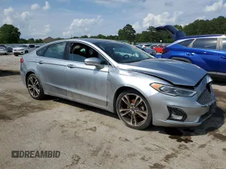 2020 Ford Fusion Titanium with VIN 3FA6P0D97LR138594, listed as a Copart auction lot 57755565 with Not provided miles and Clean title. Bid and sale history available at DreamBid. Image 4.