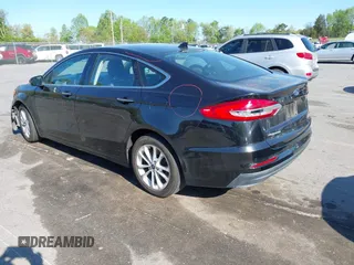 2019 Ford Fusion SEL with VIN 3FA6P0MU6KR252797, listed as a IAAI auction lot 41994504 with 106,029 mi miles and . Bid and sale history available at DreamBid. Image 3.