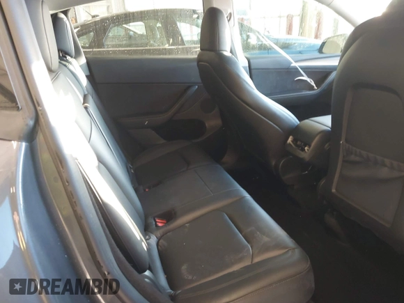 2023 Tesla Model Y Long Range with VIN 7SAYGDEE5PA033341, listed as a IAAI auction lot 41379625 with Not provided miles and . Bid and sale history available at DreamBid. Image 8.