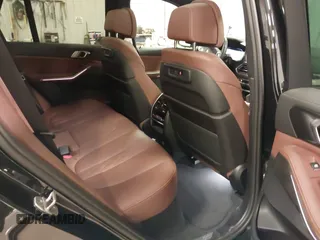 2023 BMW X5 xDrive40i with VIN 5UXCR6C08P9R88991, listed as a IAAI auction lot 41965881 with 33,136 mi miles. Bid and sale history available at carsss.com. Image 8.