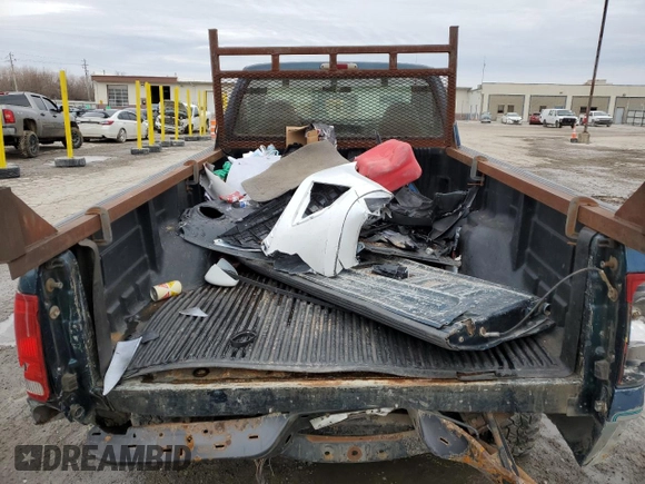 1999 Ford F-250 with VIN 1FTNF21S8XEA67992, listed as a Copart auction lot 44249795 with 157,528 mi miles and Salvage title. Bid and sale history available at DreamBid. Image 10.