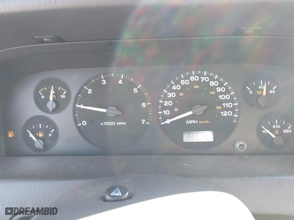 1999 Jeep Grand Cherokee Laredo with VIN 1J4GW58S5XC781472, listed as a IAAI auction lot 41738515 with 216,000 mi miles. Bid and sale history available at carsss.com. Image 7.