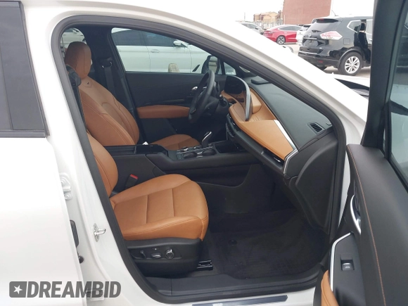 2024 Cadillac XT4 FWD Sport with VIN 1GYFZER42RF246488, listed as a IAAI auction lot 42029551 with 6,476 mi miles and . Bid and sale history available at DreamBid. Image 5.
