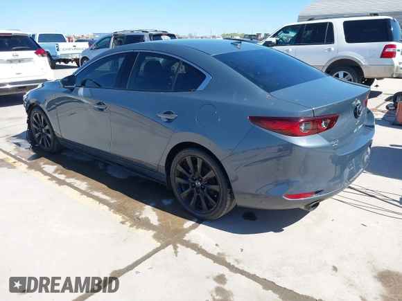 2022 Mazda 3 2.5 Turbo z VIN 3MZBPBAY8NM308426, wystawiony jako IAAI lot #41808563 z przebiegiem 44 693 mil mil oraz . Historia ofert i sprzedaży dostępna na DreamBid. Obrazek 3.