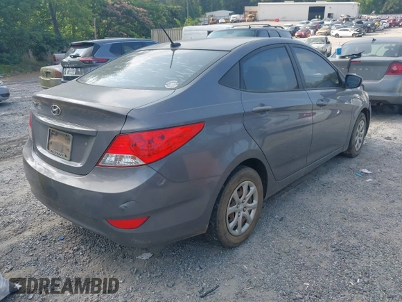 2013 Hyundai Accent GLS z VIN KMHCT4AEXDU502319, wystawiony jako IAAI lot #42423517 z przebiegiem 228 402 mil mil oraz . Historia ofert i sprzedaży dostępna na DreamBid. Obrazek 4.