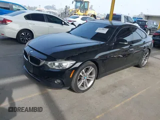 2015 BMW 4 Series 428i with VIN WBA4A9C52FGL85228, listed as a IAAI auction lot 41228043 with 152,729 mi miles and . Bid and sale history available at DreamBid. Image 17.