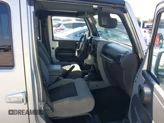 2010 Jeep Wrangler Unlimited Sport with VIN 1J4BA3H17AL211887, listed as a IAAI auction lot 41778324 with 185,626 mi miles. Bid and sale history available at carsss.com. Image 5.