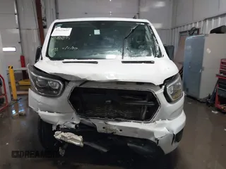 2023 Ford Transit Passenger XL with VIN 1FBAX2YGXPKA45186, listed as a IAAI auction lot 41625035 with 42,174 mi miles and . Bid and sale history available at DreamBid. Image 13.