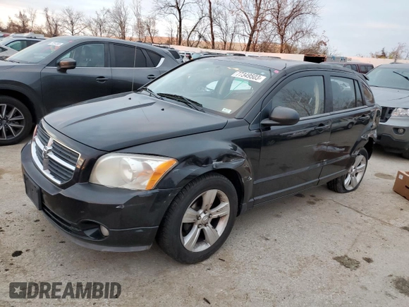 2010 Dodge Caliber Mainstreet z VIN 1B3CB3HAXAD551716, wystawiony jako Copart lot #77349503 z przebiegiem 144 209 mil mil oraz Tytuł czysty. Historia ofert i sprzedaży dostępna na DreamBid. Obrazek 1.
