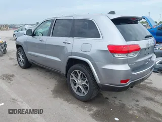2018 Jeep Grand Cherokee Limited with VIN 1C4RJFBG7JC266715, listed as a IAAI auction lot 42562005 with 101,999 mi miles and . Bid and sale history available at DreamBid. Image 3.