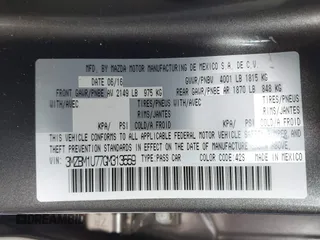 2016 Mazda Mazda3 i Sport with VIN 3MZBM1U77GM313559, listed as a IAAI auction lot 41489442 with 113,920 mi miles. Bid and sale history available at carsss.com. Image 9.