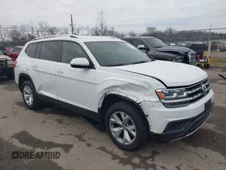 2018 Volkswagen Atlas S with VIN 1V2AP2CAXJC532712, listed as a IAAI auction lot 41177882 with 105,832 mi miles and . Bid and sale history available at DreamBid. Image 1.