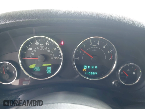 2012 Jeep Wrangler Unlimited Sport z VIN 1C4BJWDG3CL207291, wystawiony jako IAAI lot #42211454 z przebiegiem 110 864 mil mil oraz . Historia ofert i sprzedaży dostępna na DreamBid. Obrazek 7.