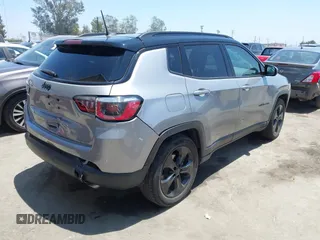 2019 Jeep Compass Latitude with VIN 3C4NJCBBXKT613848, listed as a IAAI auction lot 42598962 with 47,550 mi miles and . Bid and sale history available at DreamBid. Image 4.