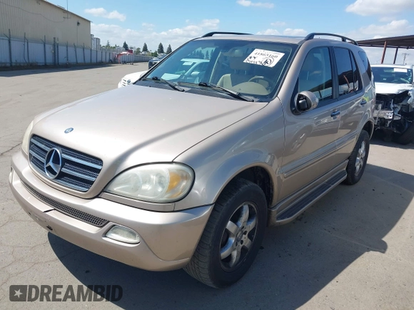 2002 Mercedes-Benz M 320/430/500 with VIN 4JGAB75E52A302663, listed as a IAAI auction lot 41865160 with 231,223 mi miles and . Bid and sale history available at DreamBid. Image 2.