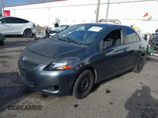 2010 Toyota Yaris with VIN JTDBT4K37A4068398, listed as a IAAI auction lot 40915313 with 123,222 mi miles. Bid and sale history available at carsss.com. Image 2.