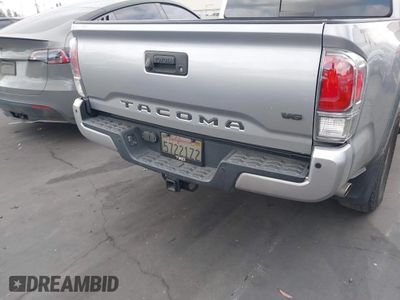 2020 Toyota Tacoma SR5 z VIN 3TMCZ5AN6LM288974, wystawiony jako IAAI lot #42185181 z przebiegiem 94 759 mil mil oraz . Historia ofert i sprzedaży dostępna na DreamBid. Obrazek 16.