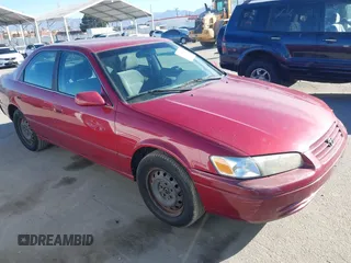 1998 Toyota Camry LE z VIN JT2BF22K2W0086396, wystawiony jako IAAI lot #40646755 z przebiegiem 176 111 mil mil oraz . Historia ofert i sprzedaży dostępna na DreamBid. Obrazek 1.