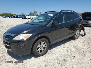 2012 Mazda CX-9 Sport z VIN JM3TB3BV0C0354646, wystawiony jako Copart lot #55971445 z przebiegiem 101 824 mil mil oraz Czysty tytuł • Clean title. Historia ofert i sprzedaży dostępna na DreamBid. Obrazek 1.