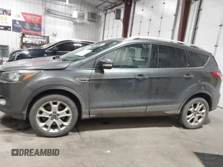 2016 Ford Escape Titanium with VIN 1FMCU9J93GUC39933, listed as a IAAI auction lot 42616323 with 116,482 mi miles and . Bid and sale history available at DreamBid. Image 14.