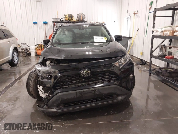 2019 Toyota RAV4 XLE with VIN 2T3P1RFV1KW052156, listed as a IAAI auction lot 41974041 with 95,442 mi miles. Bid and sale history available at carsss.com. Image 13.
