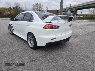 2010 Mitsubishi Lancer Evolution GSR with VIN JA32W8FV3AU021698, listed as a Copart auction lot 80026994 with 10,075 mi miles and Clean Title. Bid and sale history available at DreamBid. Image 3.