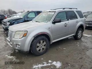 2009 Mercury Mariner z VIN 4M2CU91GX9KJ19400, wystawiony jako Copart lot #85515934 z przebiegiem Nie podano mil oraz Szkoda całkowita • Salvage title. Historia ofert i sprzedaży dostępna na DreamBid. Obrazek 1.