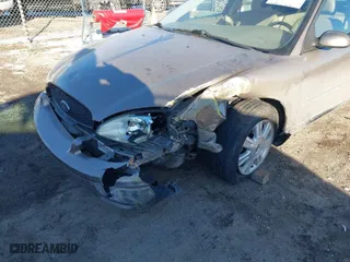 2007 Ford Taurus SEL with VIN 1FAFP56U77A161159, listed as a IAAI auction lot 41284533 with 162,883 mi miles. Bid and sale history available at carsss.com. Image 6.