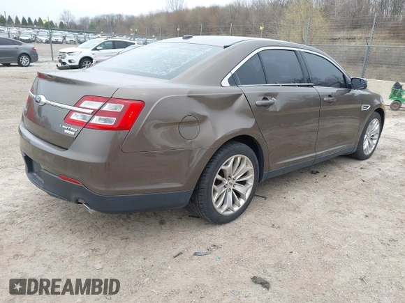 2015 Ford Taurus Limited with VIN 1FAHP2J84FG110702, listed as a IAAI auction lot 42060437 with 208,012 mi miles. Bid and sale history available at carsss.com. Image 4.