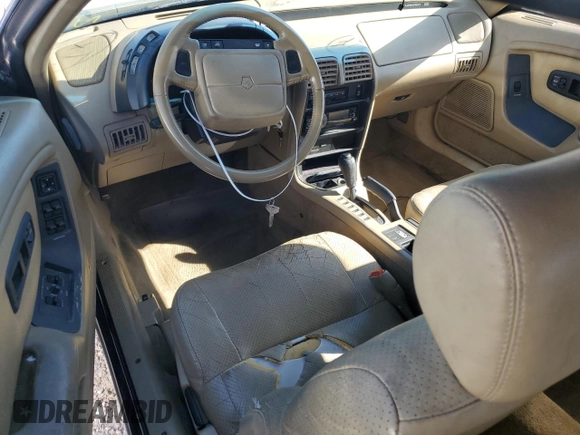 1994 Chrysler LeBaron z VIN 1C3EU4530RF259672, wystawiony jako Copart lot #80346444 z przebiegiem Nie podano mil oraz Szkody całkowita. Historia ofert i sprzedaży dostępna na DreamBid. Obrazek 8.
