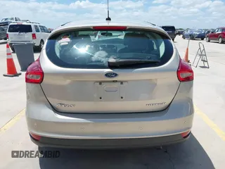 2018 Ford Focus Titanium z VIN 1FADP3N25JL279623, wystawiony jako IAAI lot #42534936 z przebiegiem 74 440 mil mil oraz . Historia ofert i sprzedaży dostępna na DreamBid. Obrazek 17.