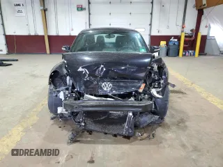 2014 Volkswagen Beetle Turbo R-Line with VIN 3VWVT7ATXEM665178, listed as a Copart auction lot 75652044 with Not Provided miles and Salvage Title. Bid and sale history available at DreamBid. Image 5.