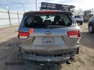 2016 Kia Sorento LX z VIN 5XYPGDA59GG072038, wystawiony jako Copart lot #50221465 z przebiegiem Nie podano mil oraz Szkoda całkowita • Salvage title. Historia ofert i sprzedaży dostępna na DreamBid. Obrazek 6.