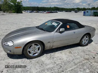 1999 Jaguar XK z VIN SAJGX2049XC034022, wystawiony jako Copart lot #55690025 z przebiegiem Nie podano mil oraz Tytuł czysty. Historia ofert i sprzedaży dostępna na DreamBid. Obrazek 1.