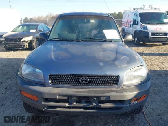 1997 Toyota RAV4 with VIN JT3GP10VXV0015872, listed as a IAAI auction lot 41827830 with 314,640 mi miles and . Bid and sale history available at DreamBid. Image 12.
