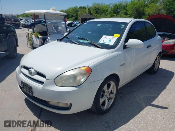 2007 Hyundai Accent SE with VIN KMHCN36C47U009459, listed as a IAAI auction lot 41979395 with 202,844 mi miles. Bid and sale history available at carsss.com. Image 2.