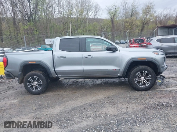 2024 GMC Canyon 4WD AT4 with VIN 1GTP6DEKXR1143138, listed as a IAAI auction lot 41952154 with 26,062 mi miles. Bid and sale history available at carsss.com. Image 13.