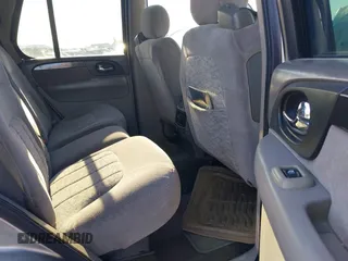 2003 GMC Envoy SLE with VIN 1GKDT13S732168534, listed as a IAAI auction lot 38049193 with 230,894 mi miles. Bid and sale history available at carsss.com. Image 8.