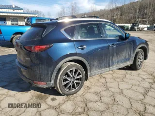 2018 Mazda CX-5 Grand Touring with VIN JM3KFBDM8J0399975, listed as a Copart auction lot 45998115 with 98,037 mi miles and Salvage Title. Bid and sale history available at DreamBid. Image 3.