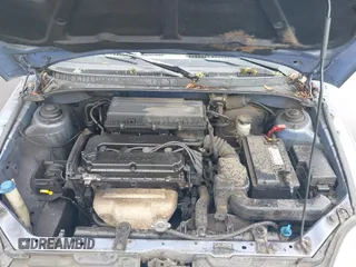 2003 Kia Rio with VIN KNADC125736227286, listed as a IAAI auction lot 41928174 with 151,431 mi miles. Bid and sale history available at carsss.com. Image 10.
